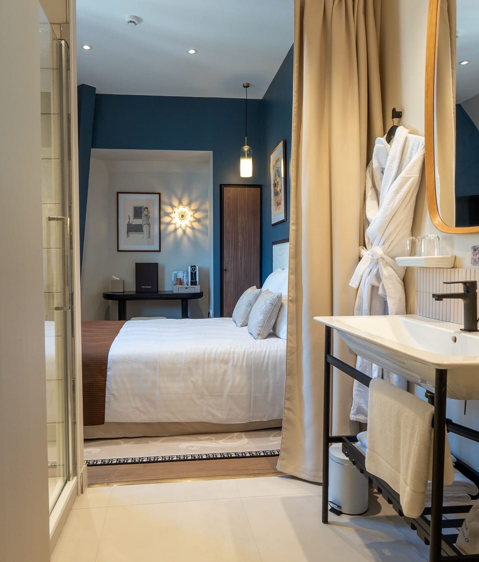 Single Room | Bathroom | Shower, hair dryer, bathrobes, slippers