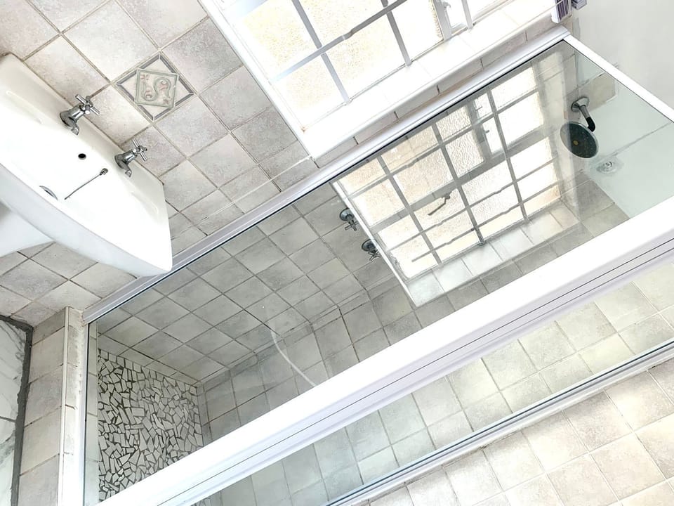 Basic Double Room | Bathroom | Shower, towels