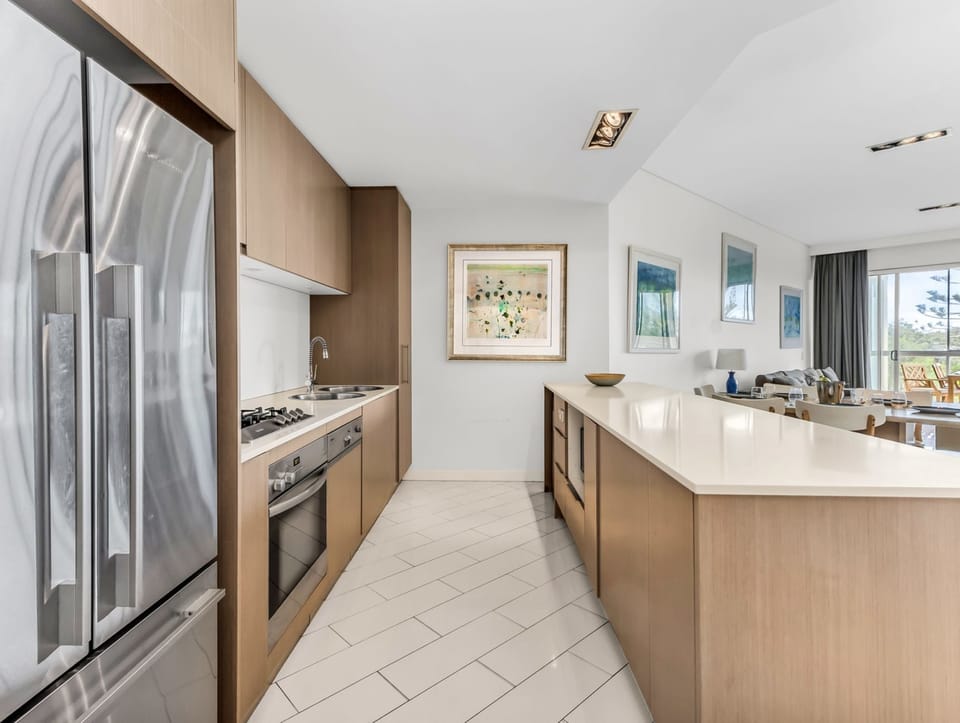 Deluxe Apartment, 3 Bedrooms, Garden View | Private kitchen | Coffee/tea maker, electric kettle, toaster, cleaning supplies