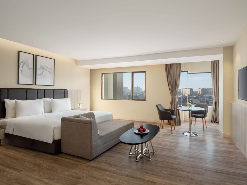 Junior Double or Twin Room | Living area | TV