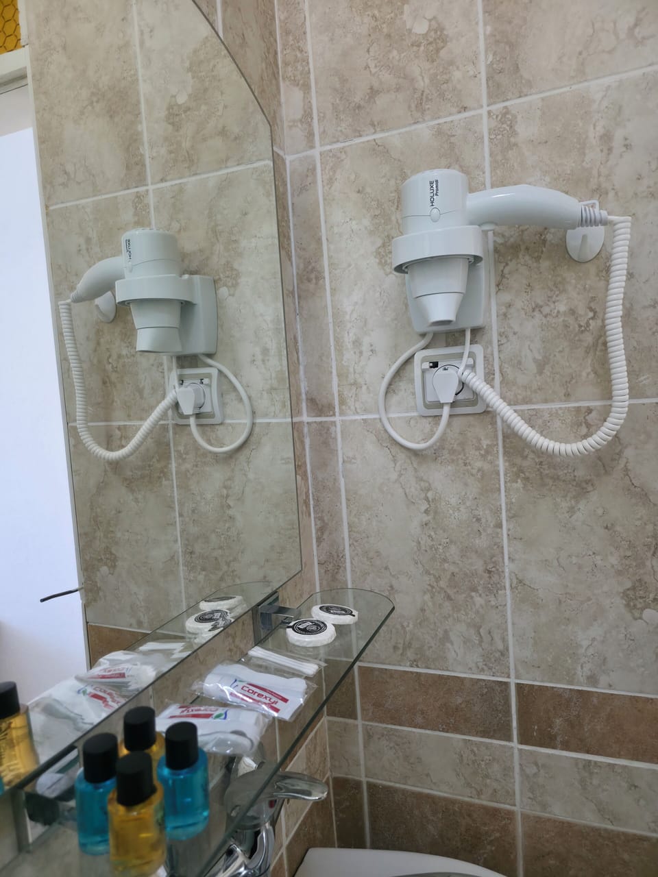 Shower, slippers, towels, shampoo