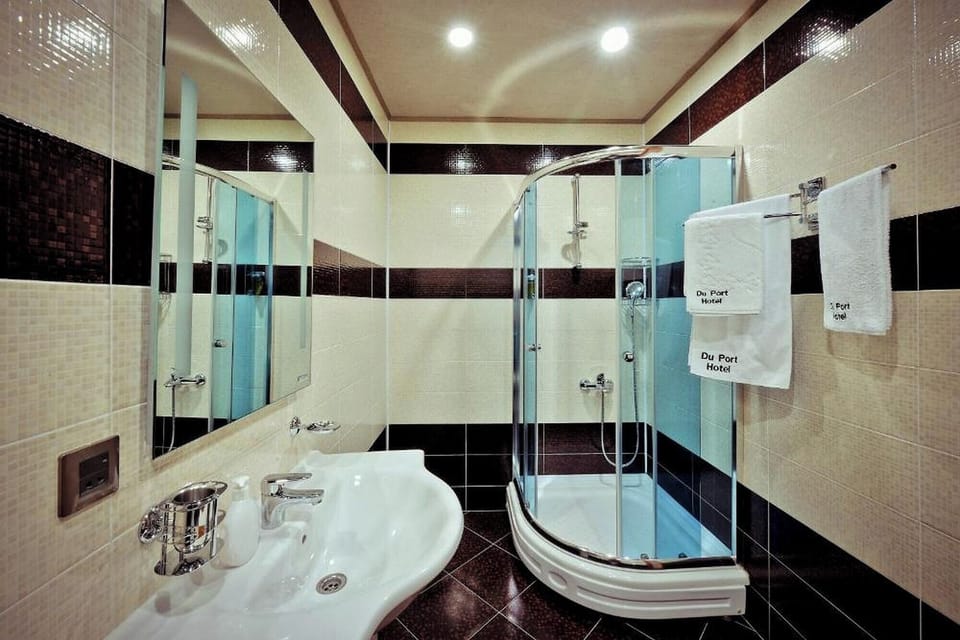 Shower, free toiletries, hair dryer, bathrobes