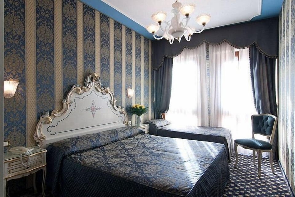 Triple Room | In-room safe, soundproofing, free WiFi, bed sheets