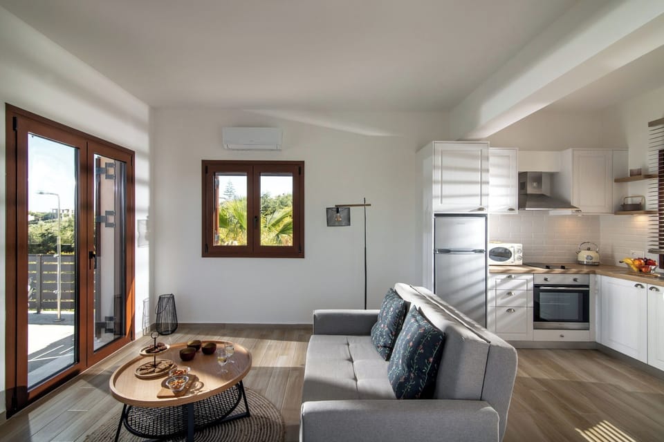 Superior Villa, Sea View | Living area | Flat-screen TV