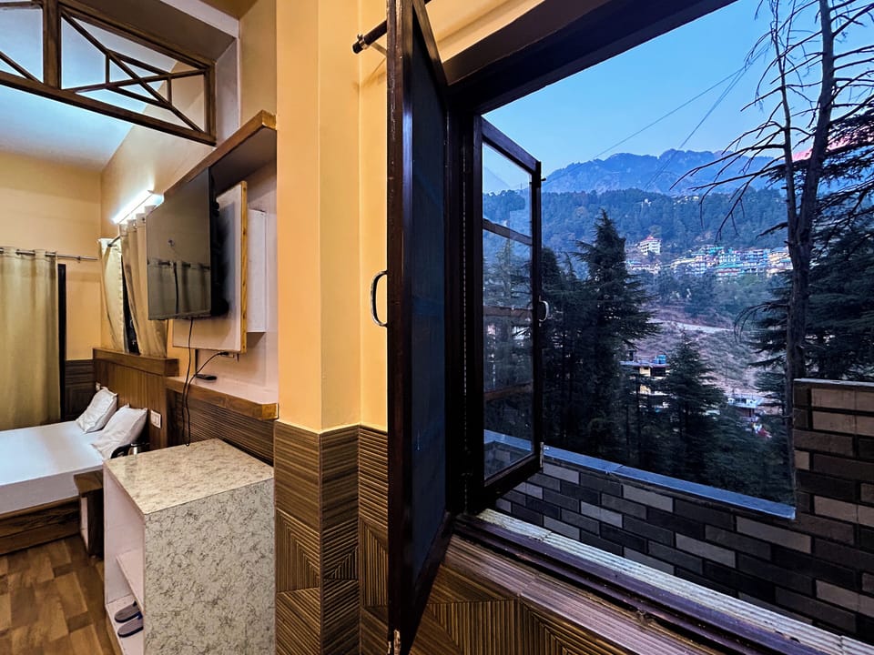 Family Quadruple Room, Mountain View | Free WiFi, bed sheets