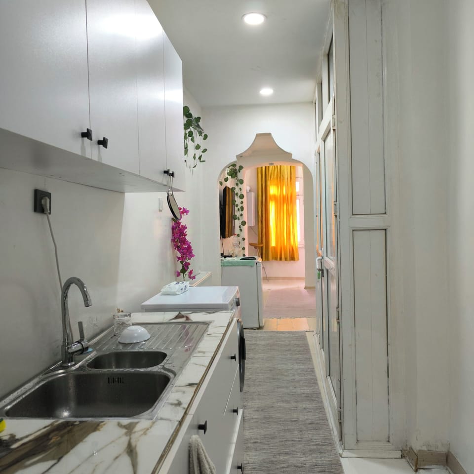 Condo, Balcony, City View | Private kitchen | Shared fridge