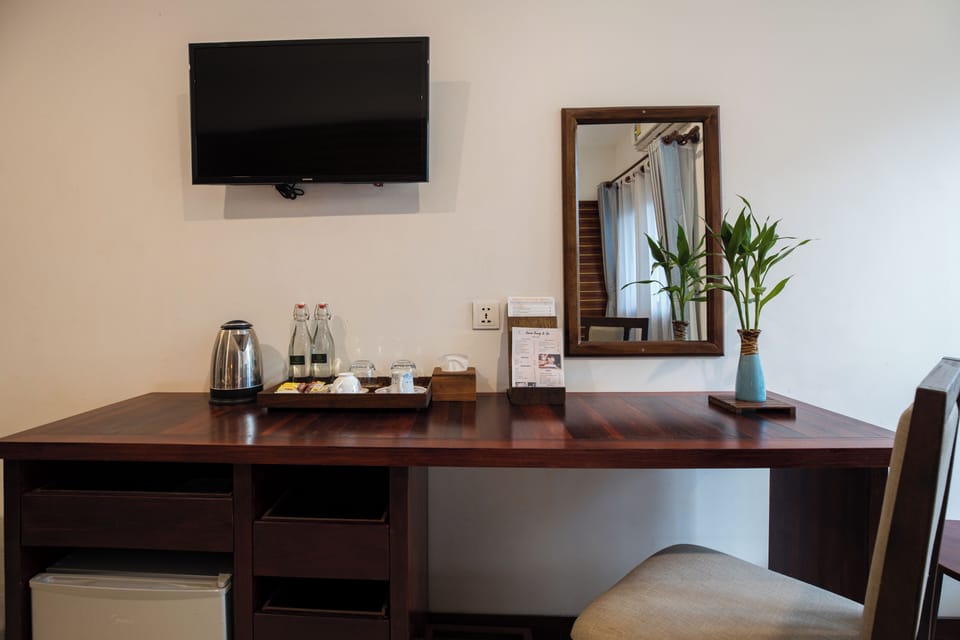 Deluxe Twin Room, Pool View | Minibar, laptop workspace, free WiFi