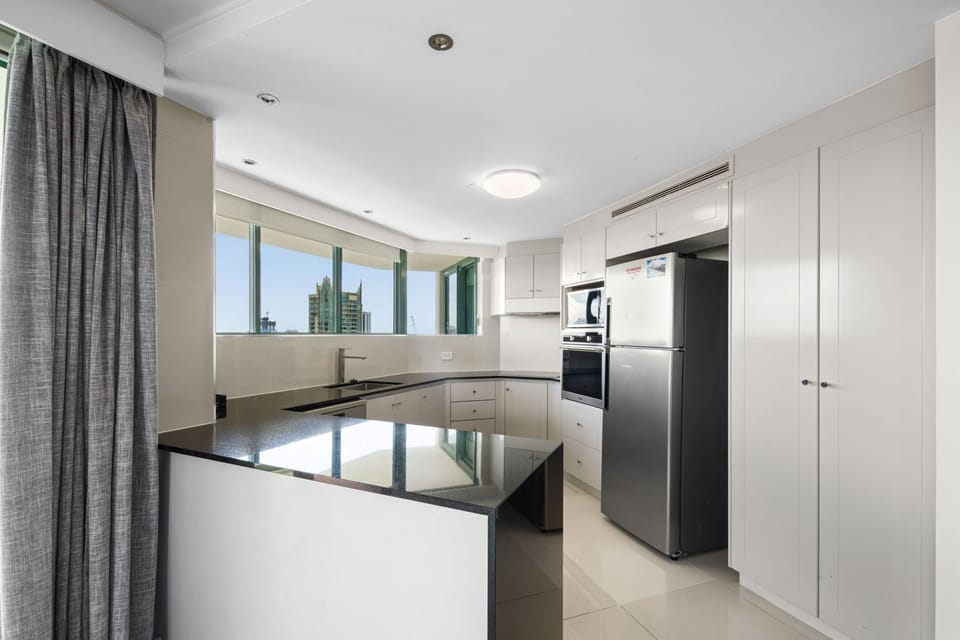Deluxe Apartment, Balcony, Sea View | Private kitchen | Electric kettle, toaster, cleaning supplies, freezer