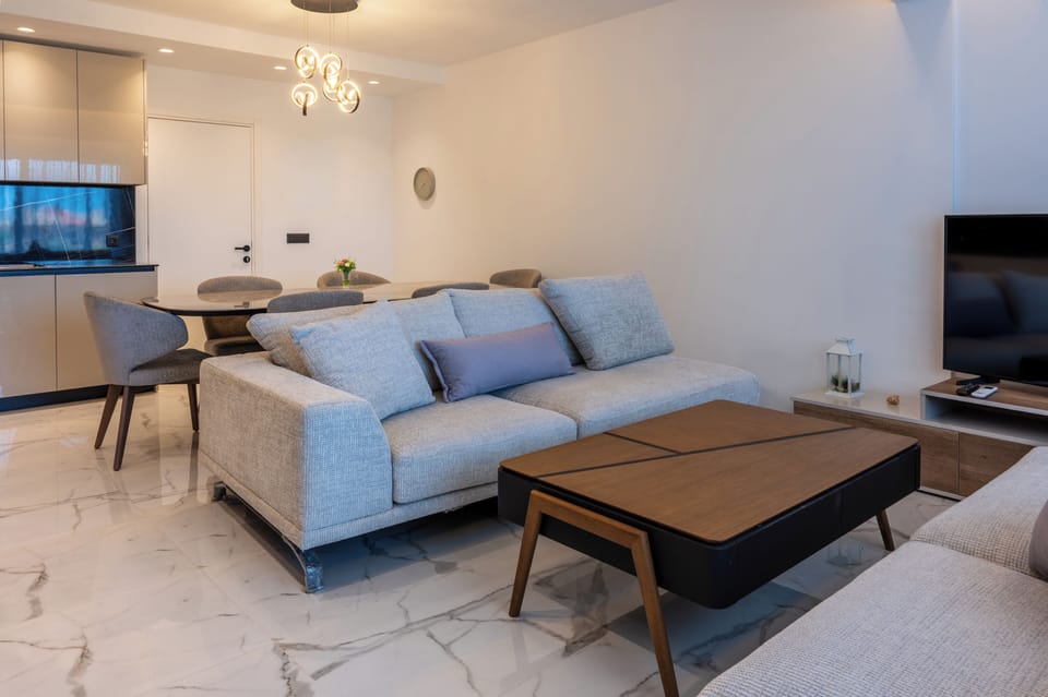 Penthouse, Balcony, Garden View | Living area | 24-inch Smart TV with satellite channels
