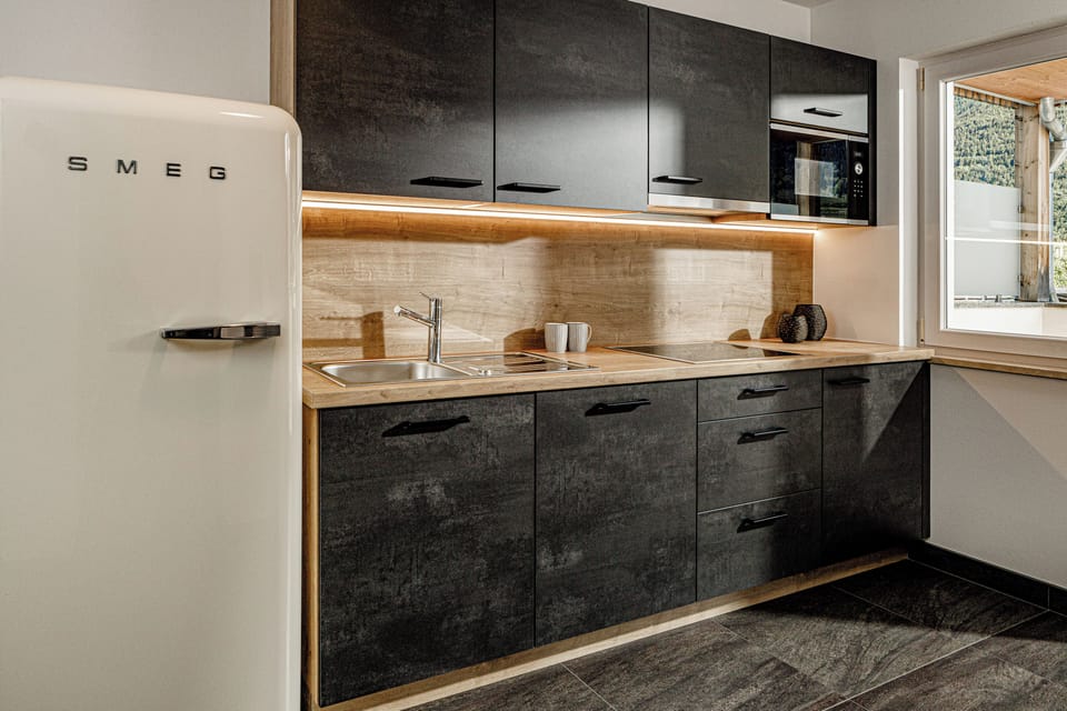 Premium Suite with private Sauna, 2 Balconies, Mountain view | Private kitchen | Full-size fridge, stovetop, dishwasher, cookware/dishes/utensils