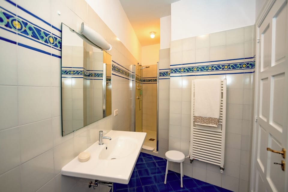 Classic Triple Room, Sea View | Bathroom | Shower, hair dryer, slippers, bidet