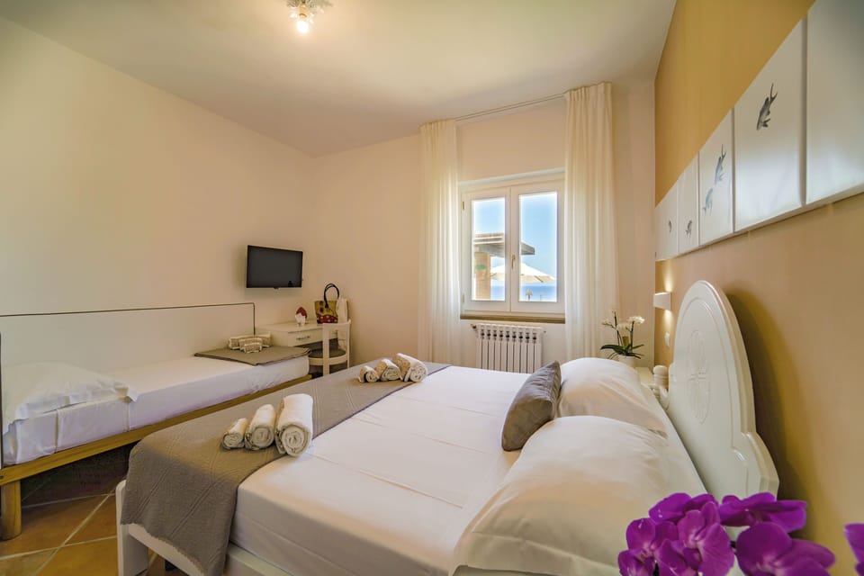 Classic Triple Room, Sea View | Minibar, in-room safe, desk, WiFi (free)