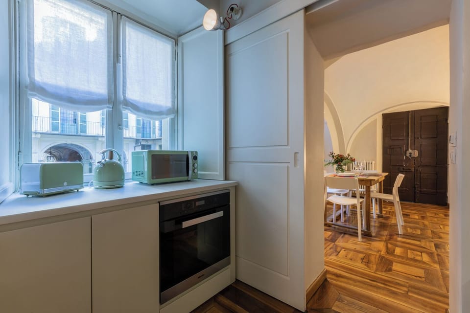 Deluxe Apartment | Private kitchen | Espresso maker, coffee/tea maker, toaster, cookware/dishes/utensils