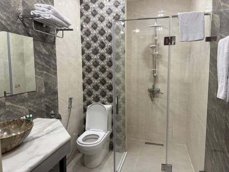 Premium Single Room | Bathroom | Hair dryer, slippers, towels, soap
