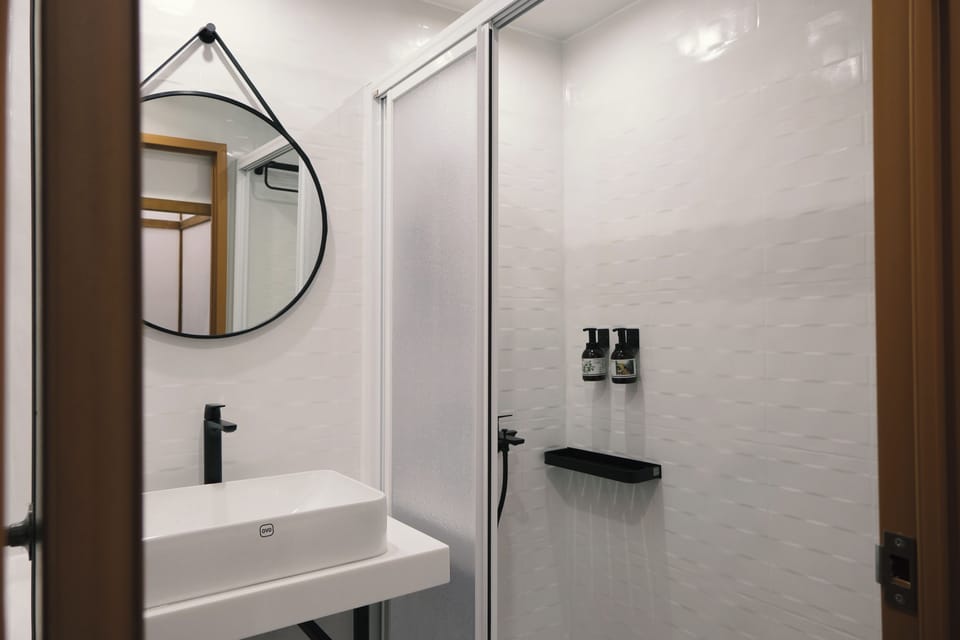 Japanese-style Room, 2 Bedrooms, Courtyard View | Bathroom | Shower, rainfall showerhead, hair dryer, slippers