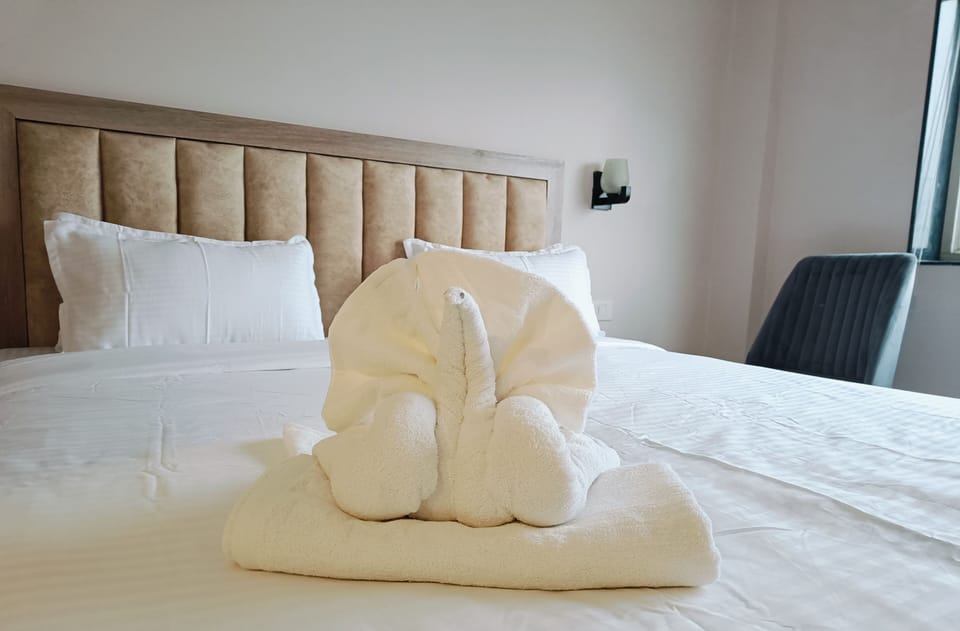 Deluxe Double Room, Garden View | Laptop workspace, iron/ironing board, free WiFi