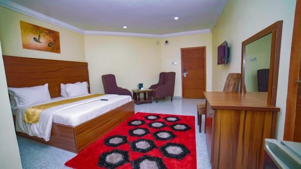 Deluxe Room, Balcony, City View | Desk, laptop workspace, blackout drapes, soundproofing