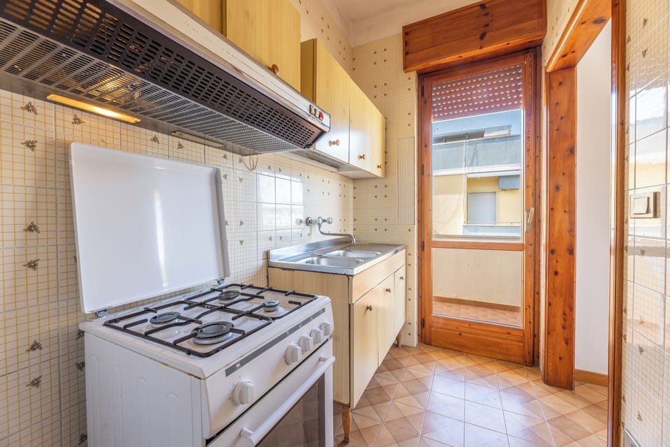 Apartment, Balcony, City View | Private kitchen | Fridge, oven, stovetop, cookware/dishes/utensils