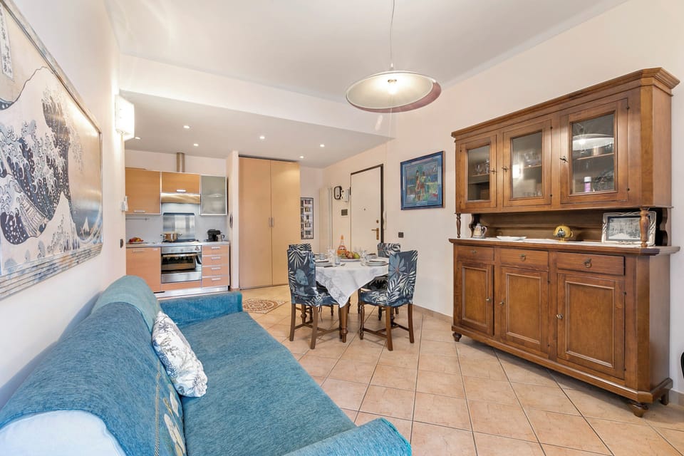 Family Apartment, Multiple Bedrooms (Domus 21 Near Alassio Beach) | Living area | 21-inch flat-screen TV with satellite channels