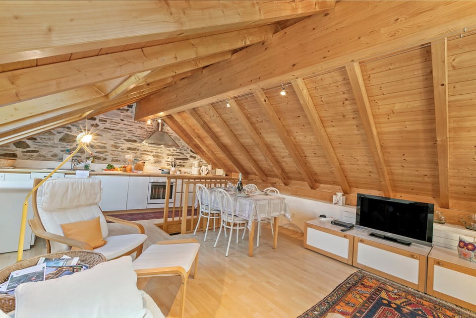 Family Chalet, Multiple Bedrooms, Mountainside (Rustico Paese Verzasca) | Living area | 21-inch flat-screen TV with digital channels