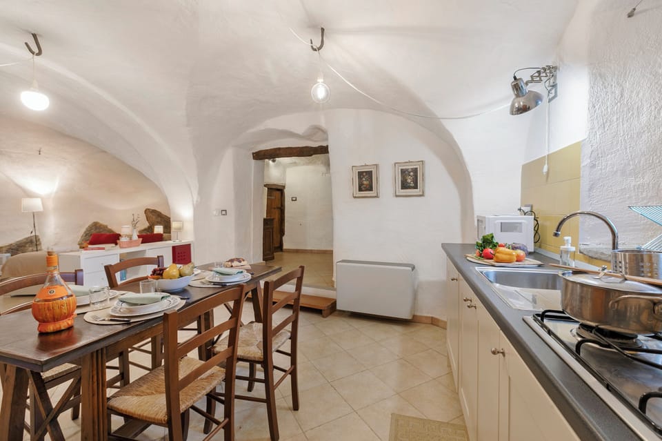 Standard Apartment, Multiple Bedrooms (La Casetta Del Borgo) | Private kitchen | Microwave, stovetop, electric kettle, cookware/dishes/utensils