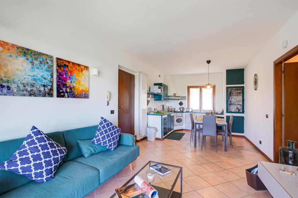 Family Apartment, 2 Bedrooms, Microwave, Mountainside (Lakeview Bliss / pool & fenced Garden) | Living area | Smart TV