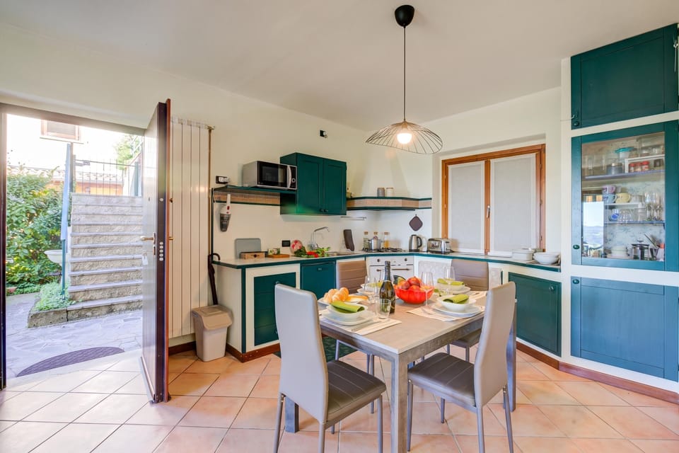 Family Apartment, 2 Bedrooms, Microwave, Mountainside (Lakeview Bliss / pool & fenced Garden) | Private kitchenette | Dishwasher