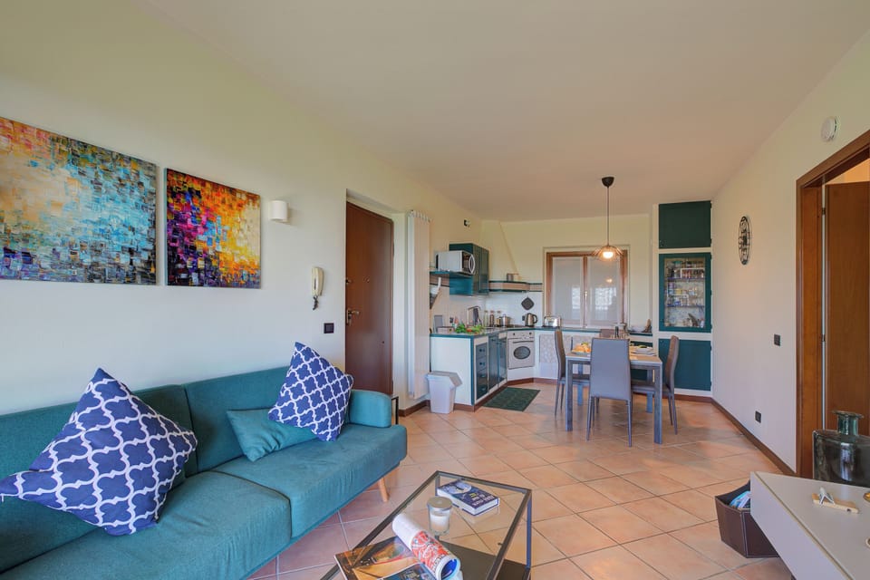 Family Apartment, Multiple Bedrooms, Mountainside (Lakeview Bliss / pool & fenced Garden) | Living area | 21-inch Smart TV with cable channels