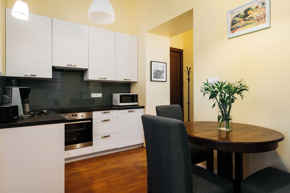 Apartment, City View | Private kitchen | Coffee/tea maker