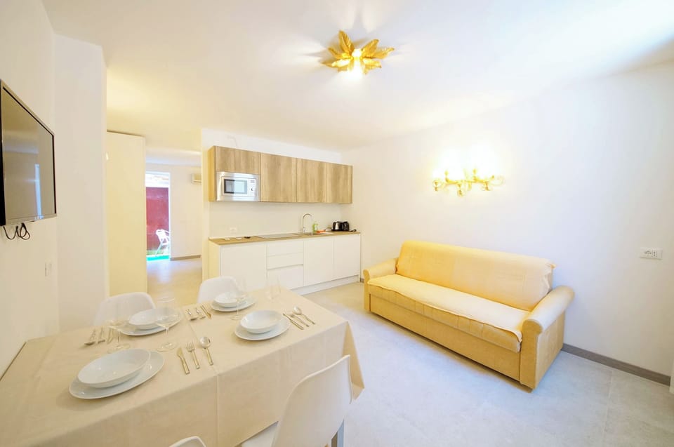 Apartment, Patio | Living area | Flat-screen TV