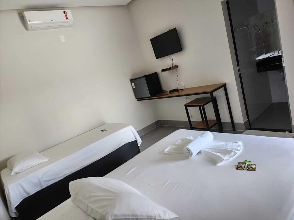 Family Triple Room, Patio | Desk, free WiFi