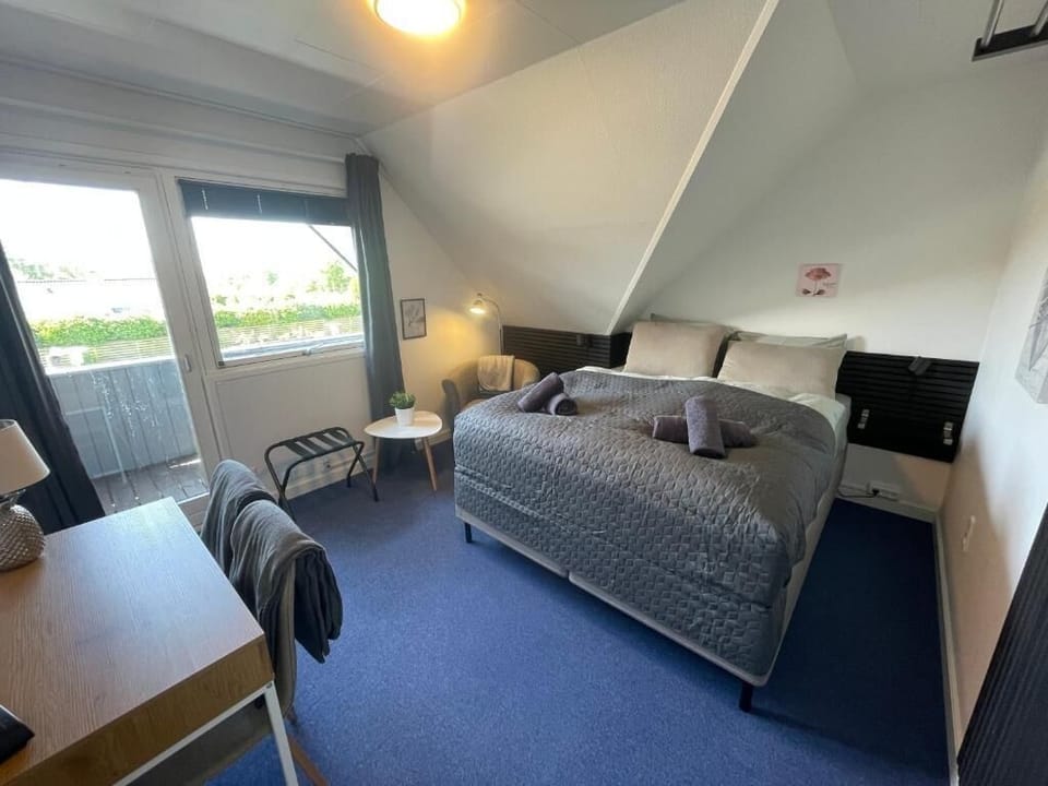 Comfort Double Room, Courtyard View | Desk, laptop workspace, blackout drapes, iron/ironing board