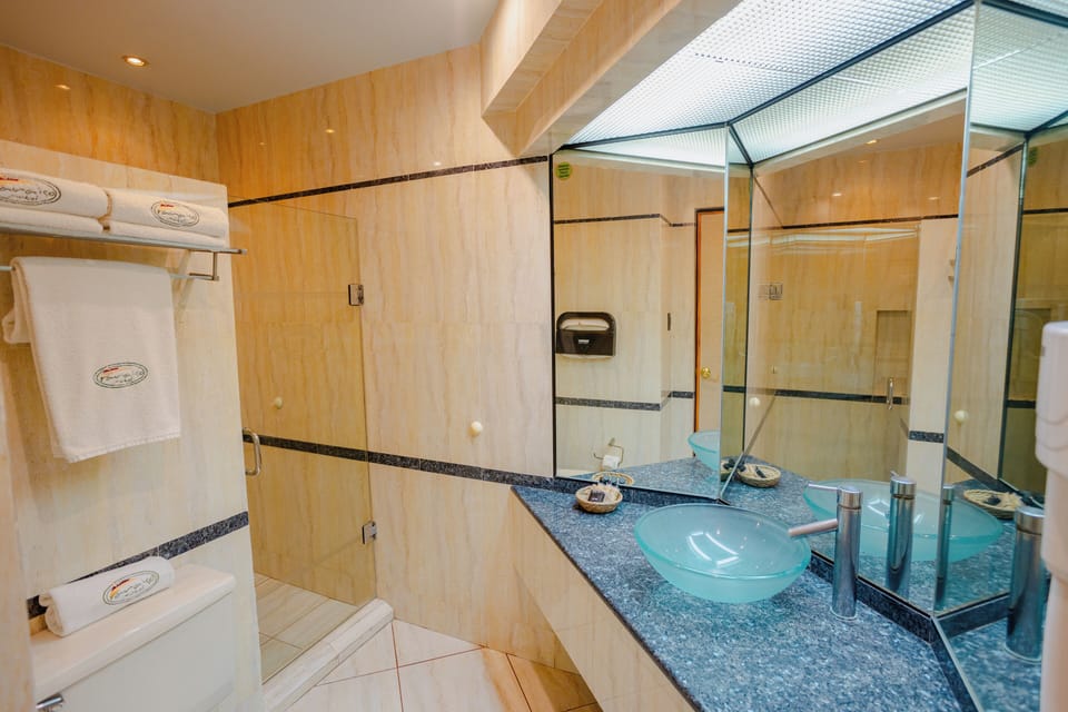 Luxury Suite, Resort View | Bathroom | Shower, free toiletries, hair dryer, towels