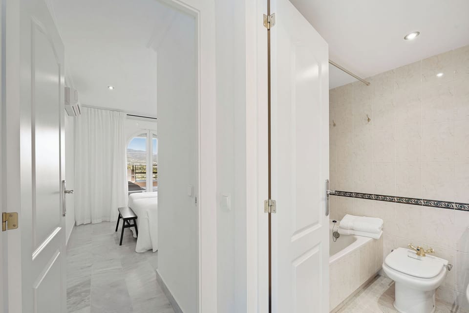 Exclusive Apartment, Ocean View | 2 bedrooms, blackout drapes, iron/ironing board, free WiFi