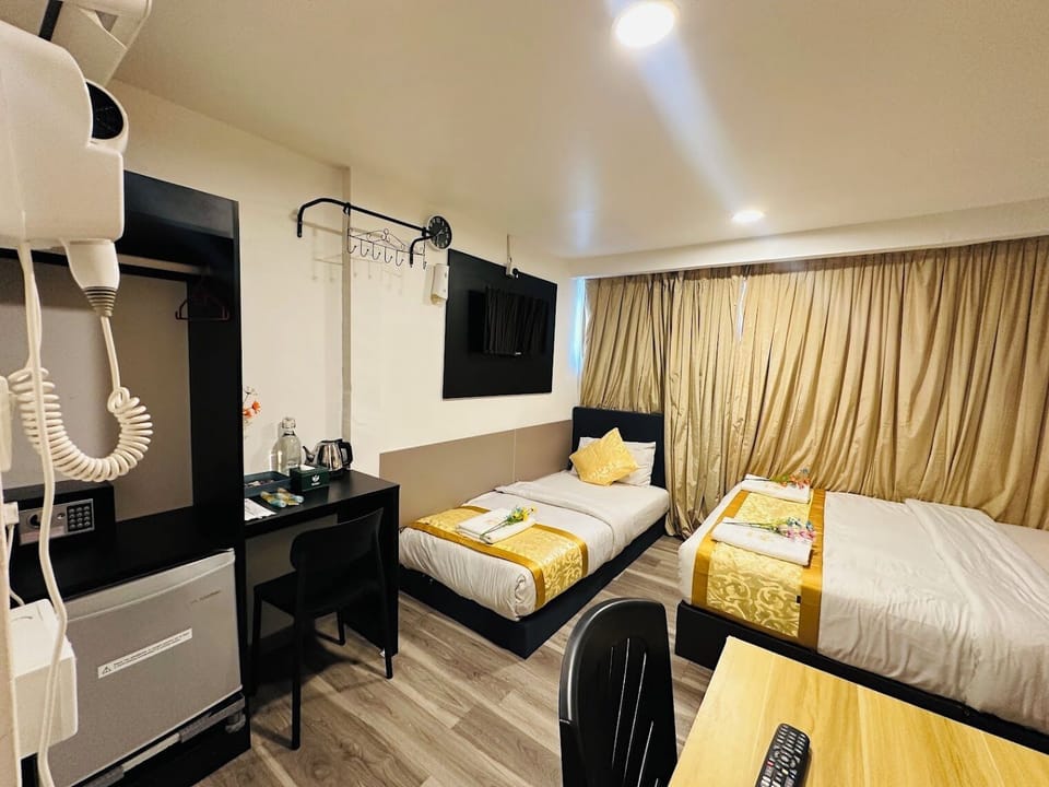 Deluxe Triple Room | Premium bedding, down comforters, Select Comfort beds, minibar