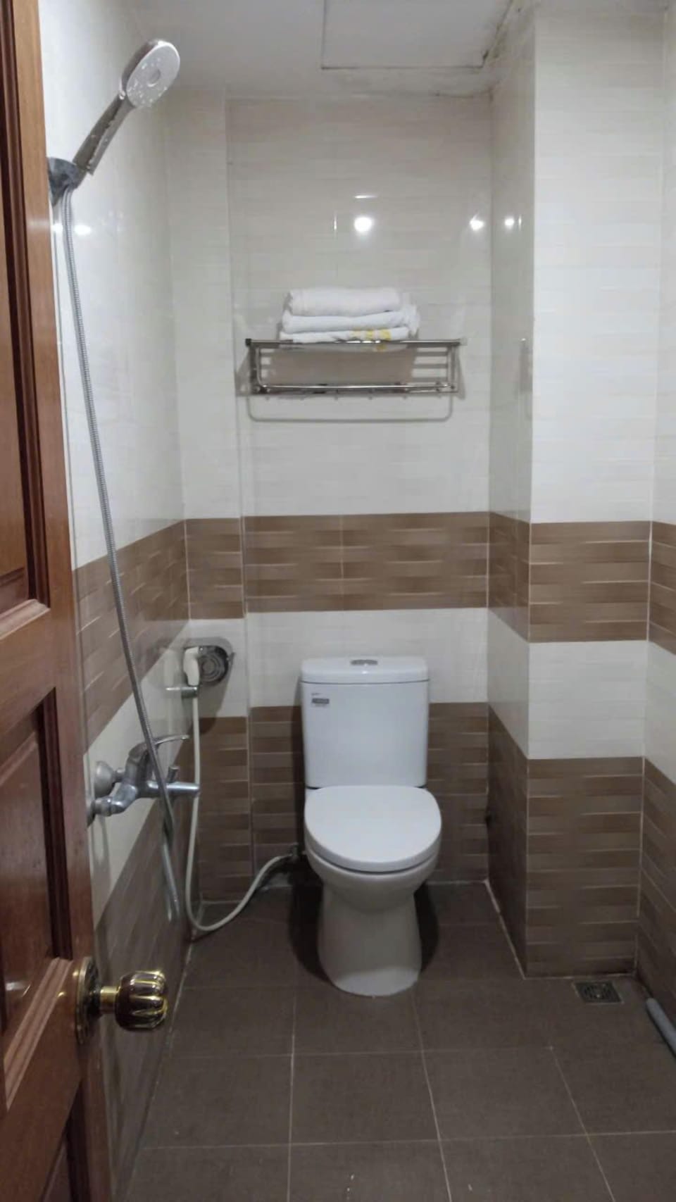 Shower, rainfall showerhead, designer toiletries, hair dryer