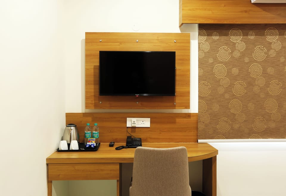 Premium Double Room, City View | Television