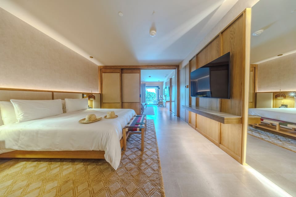 Premium bedding, down comforters, free minibar, in-room safe