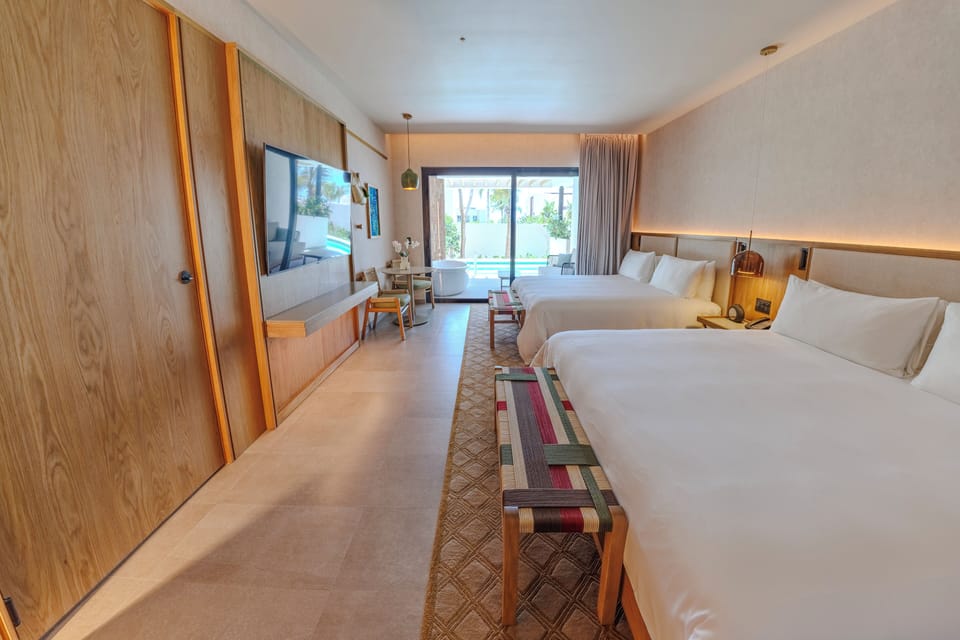 Premium bedding, down comforters, free minibar, in-room safe