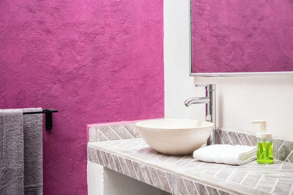 Shower, rainfall showerhead, hair dryer, towels