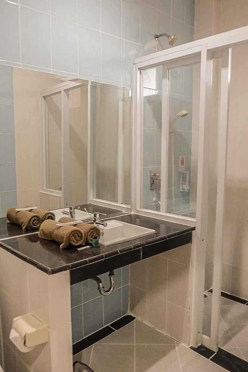 Shower, towels, soap, shampoo