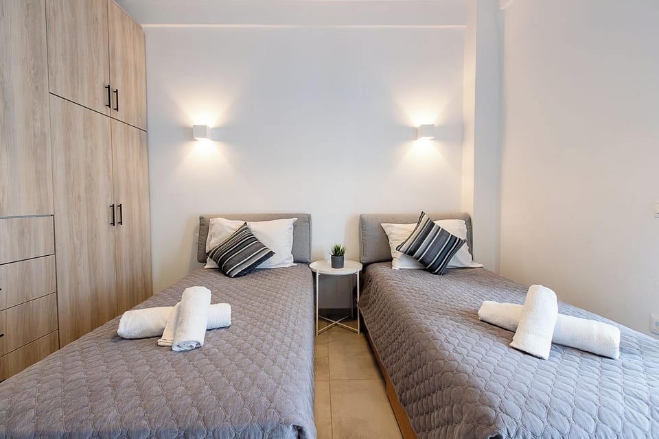 Family Apartment, Balcony, Pool View | 2 bedrooms, in-room safe, iron/ironing board, free cribs/infant beds