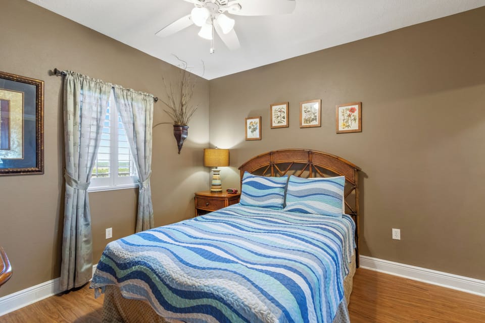Deluxe Condo, 2 Bedrooms, Balcony, Beach View | Iron/ironing board, WiFi (free), individually decorated