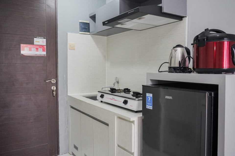 Apartment | Private kitchen | Fridge, stovetop, rice cooker, cookware/dishes/utensils