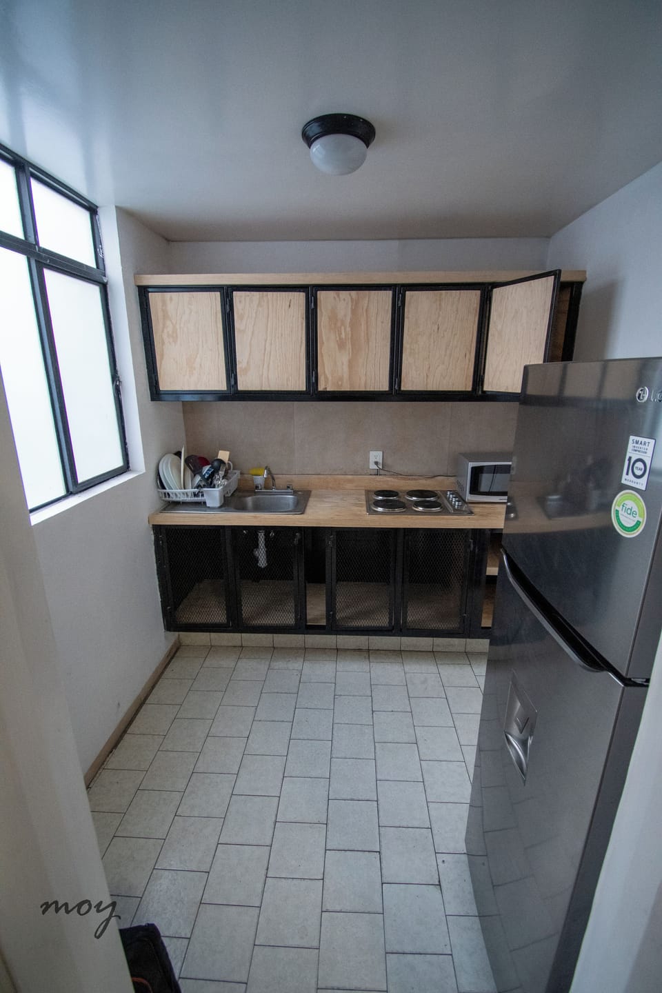 Comfort Apartment | Private kitchen | Full-size fridge, microwave, cookware/dishes/utensils