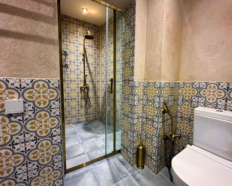 Shower, slippers, soap, shampoo