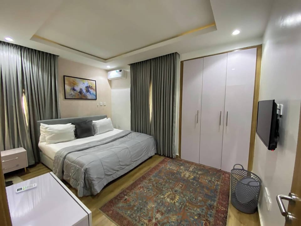 Family Apartment, Balcony, City View | 1 bedroom, desk, laptop workspace, blackout drapes