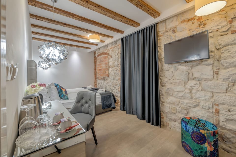 Deluxe Double Room | In-room safe, desk, blackout drapes, iron/ironing board