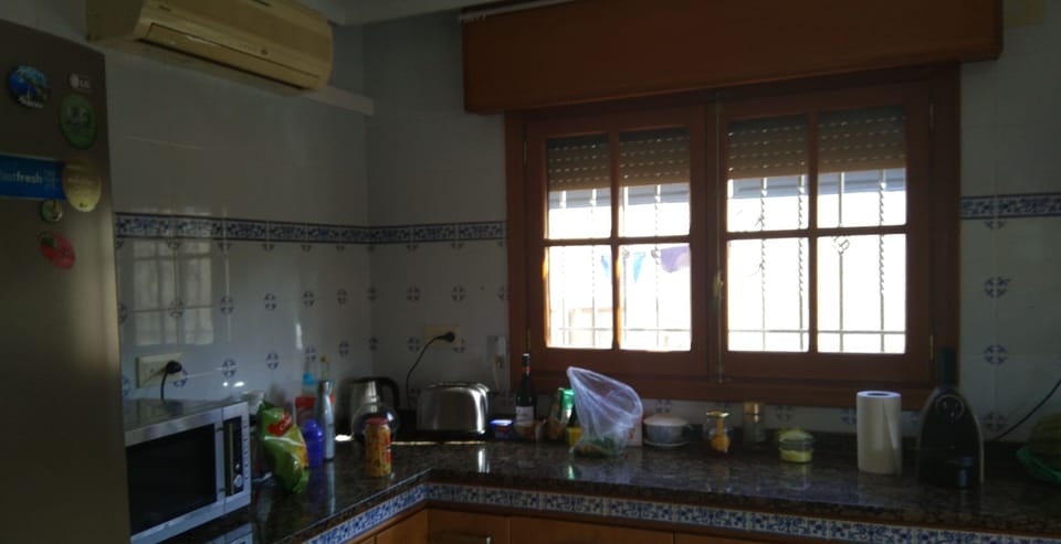 Deluxe Apartment, 3 Bedrooms, Partial Sea View | Private kitchen | Full-size fridge, microwave, oven, stovetop