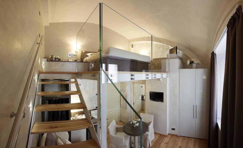Junior Duplex | Down comforters, Select Comfort beds, minibar, in-room safe